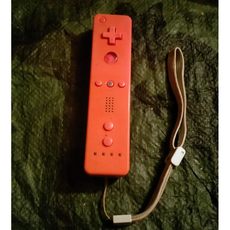 Manette Nintendo Wiimote avec dragonne - rose